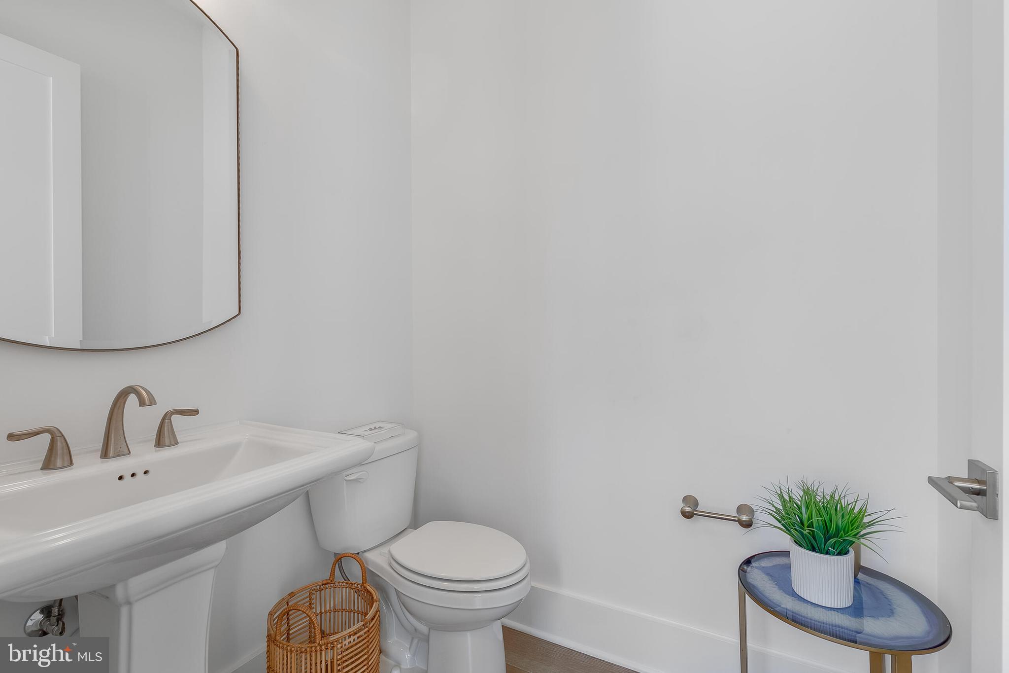 8201 River Road Bethesda, MD 20817 - Photo 16 of 50 a bathroom with a sink and a toilet