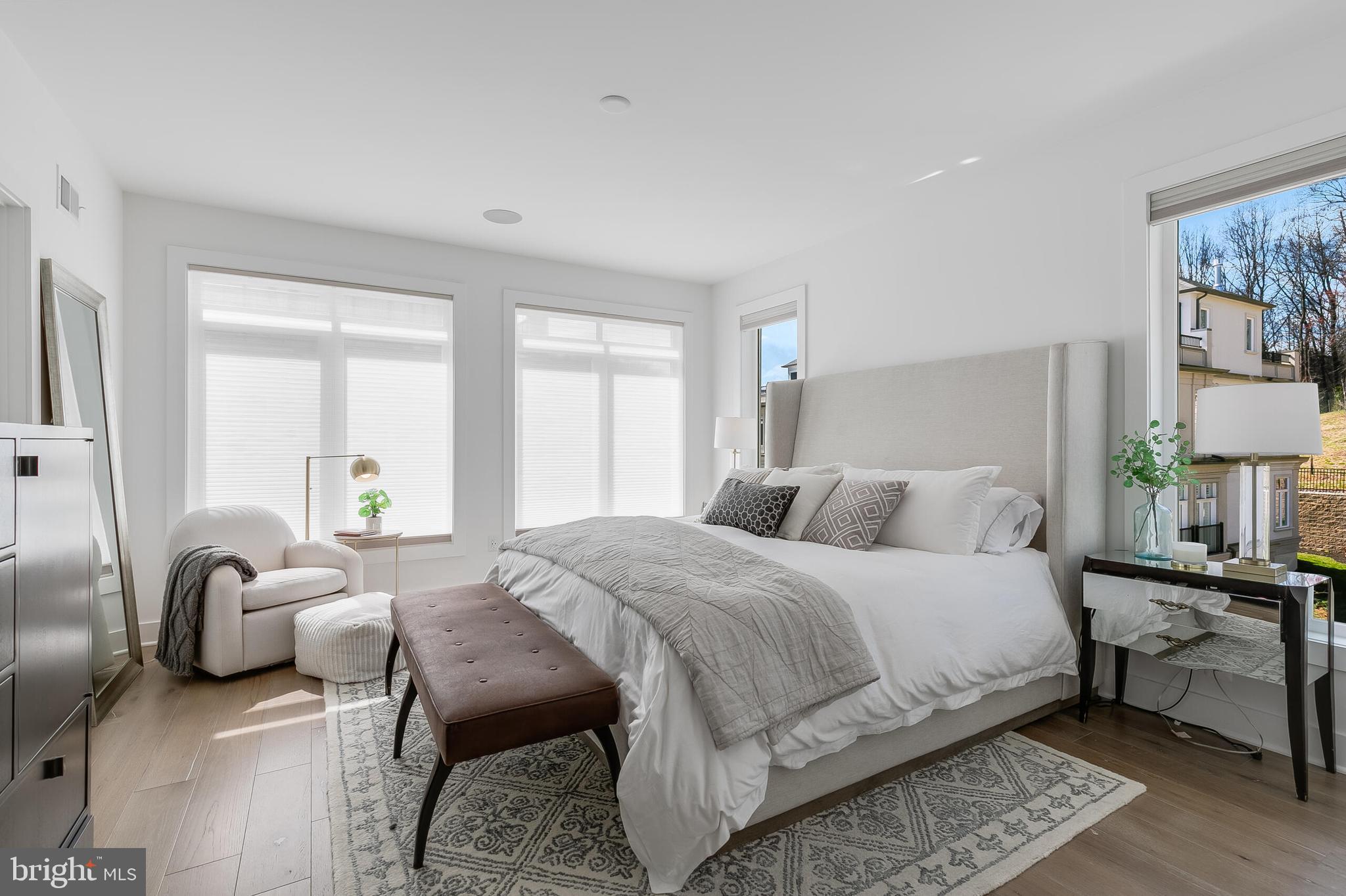 8201 River Road Bethesda, MD 20817 - Photo 18 of 50 a bedroom with a bed and wooden floor