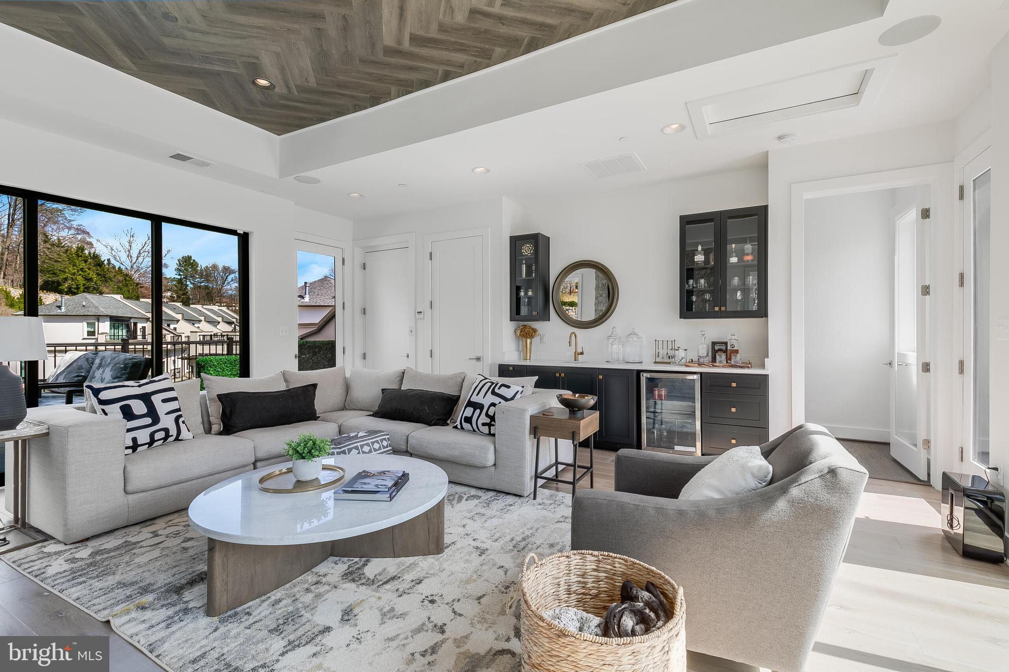 8201 River Road Bethesda, MD 20817 - Photo 30 of 50 a living room with furniture and a table