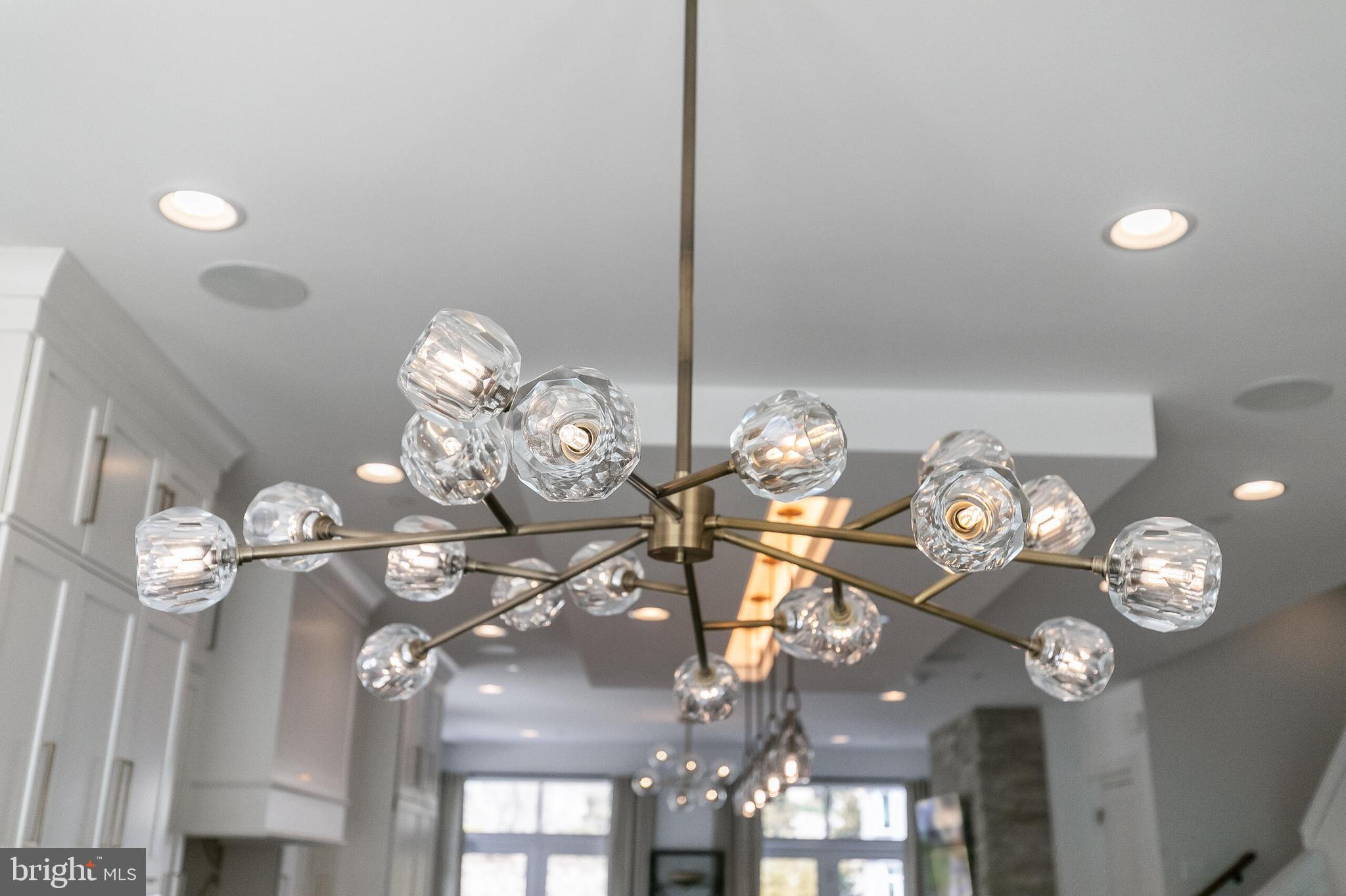 8201 River Road Bethesda, MD 20817 - Photo 36 of 50 a view of a chandelier with glass windows