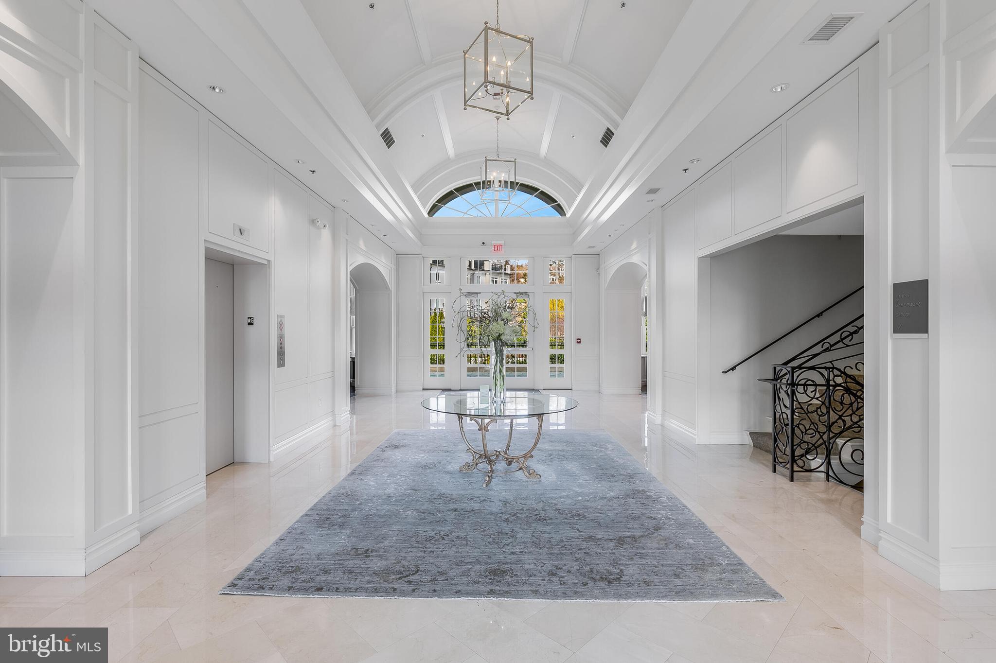 8201 River Road Bethesda, MD 20817 - Photo 41 of 50 a view of a hallway with furniture and a chandelier