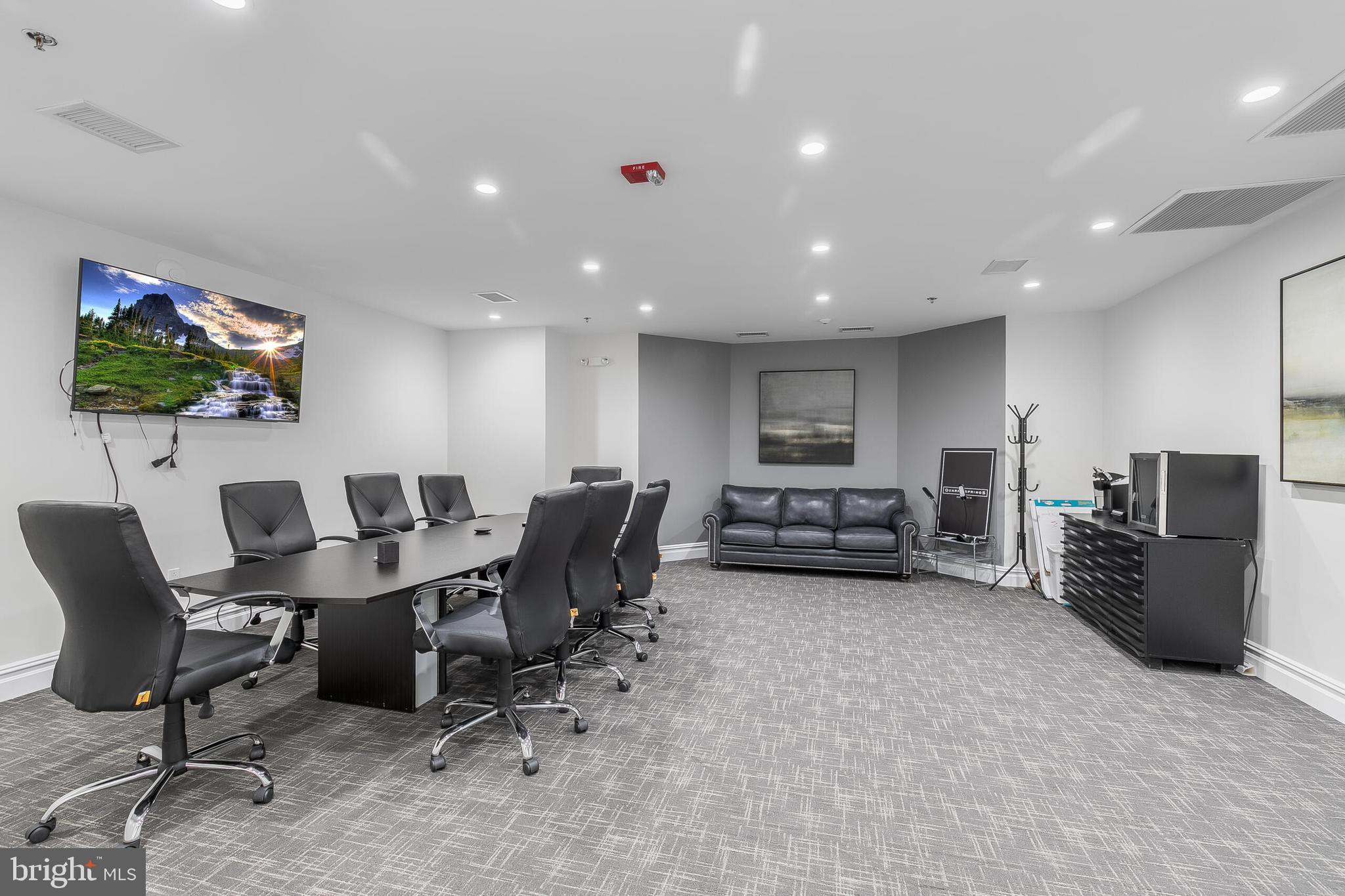 8201 River Road Bethesda, MD 20817 - Photo 45 of 50 a view of a livingroom with furniture and a flat screen tv