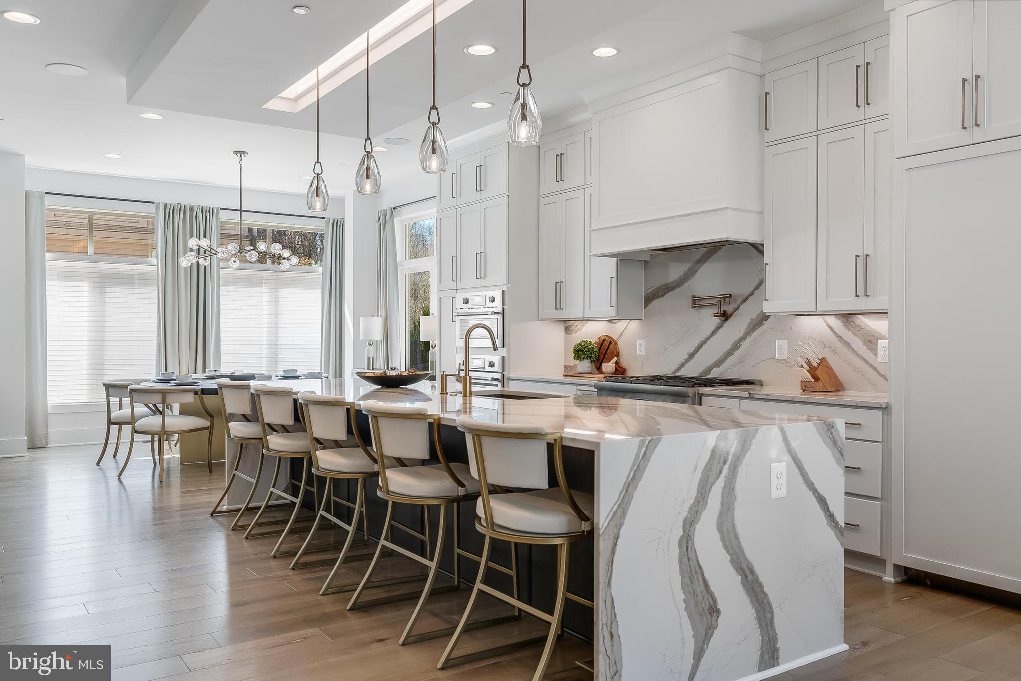 8201 River Road Bethesda, MD 20817 - Photo 10 of 50 a kitchen with appliances cabinets and chair