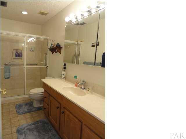 5573 Ponte Verde Road Pensacola, FL 32507 - Photo 16 of 24 The master bathroom