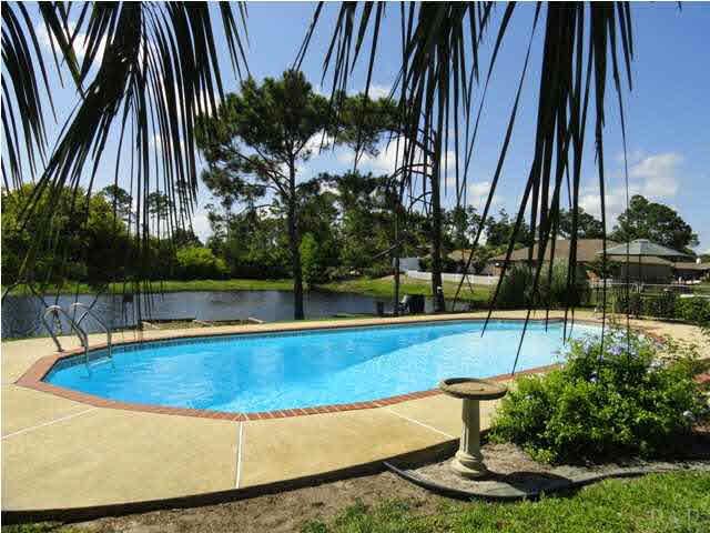 5573 Ponte Verde Road Pensacola, FL 32507 - Photo 24 of 24 One more look at the pool and lake