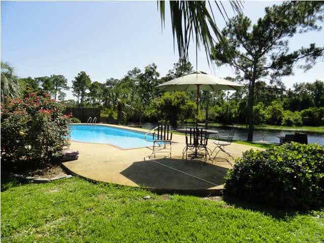 5573 Ponte Verde Road Pensacola, FL 32507 - Photo 3 of 24 A view of the pool from the covered barbeque area