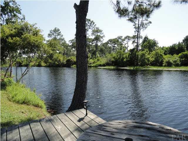 5573 Ponte Verde Road Pensacola, FL 32507 - Photo 6 of 24 On the lakefront is a dock for sitting and sunning