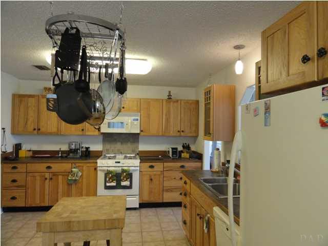 5573 Ponte Verde Road Pensacola, FL 32507 - Photo 7 of 24 This kitchen has lots of space for the cook