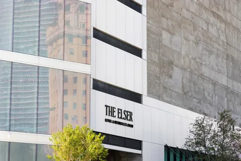 a sign that is on the side of a building