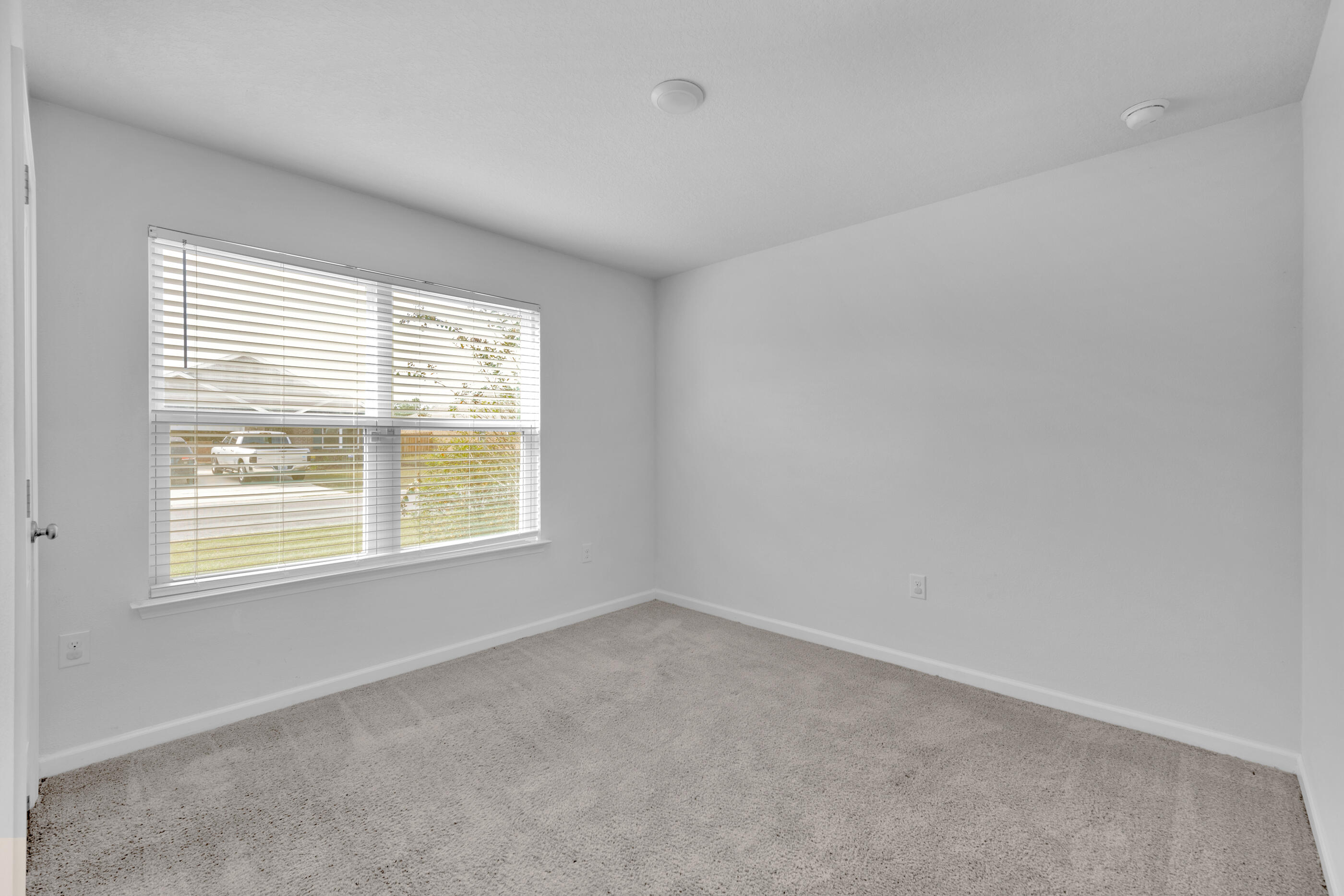 812 Moorhen Way Crestview, FL 32539 - Photo 17 of 22 an empty room with a window