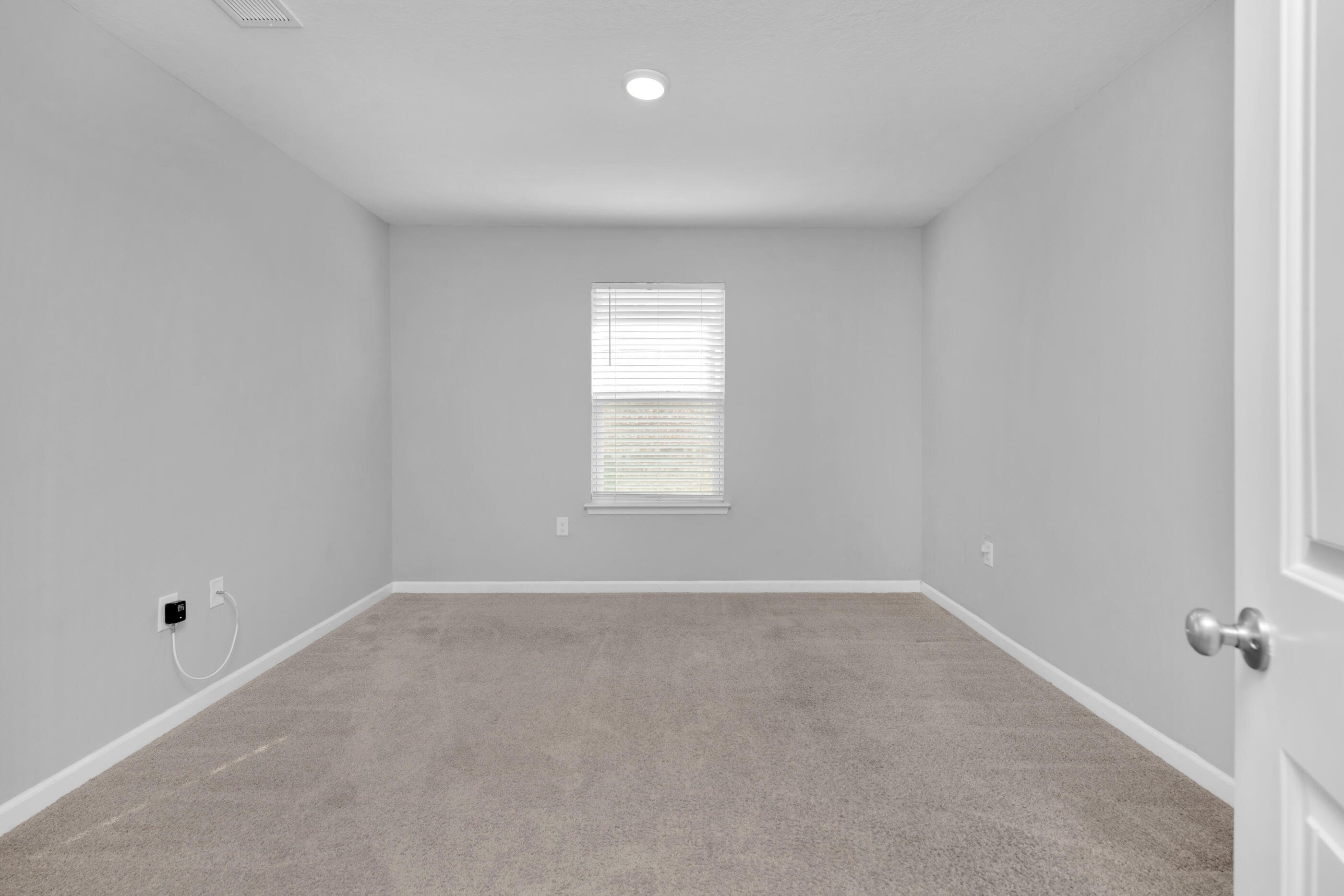 812 Moorhen Way Crestview, FL 32539 - Photo 20 of 22 a view of an empty room with a window