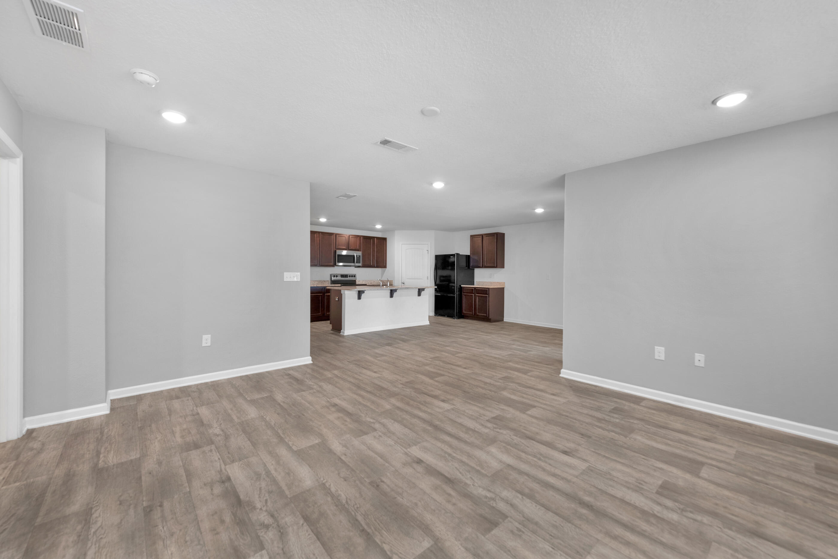 812 Moorhen Way Crestview, FL 32539 - Photo 9 of 22 a view of kitchen and refrigerator