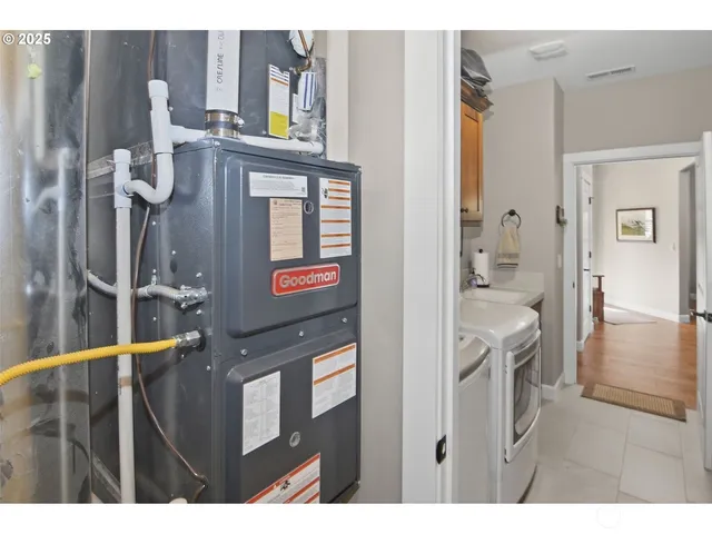 a bathroom with a sink a mirror and a shower