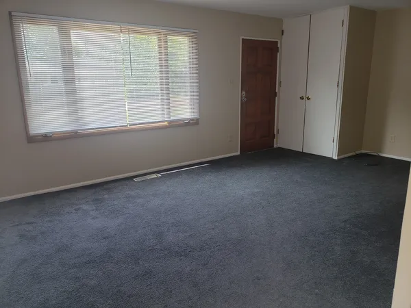 an empty room with a window