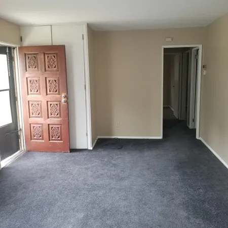 a view of an empty room with window