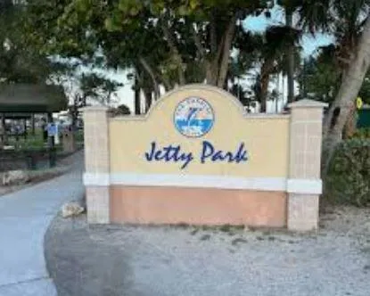 a view of a yard with an ocean view