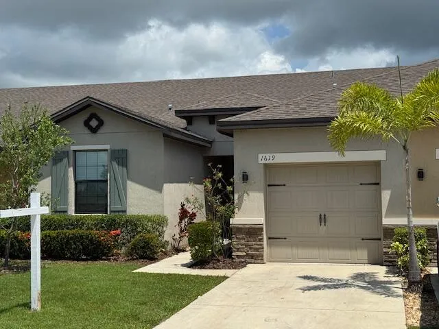 a house view with a garden space