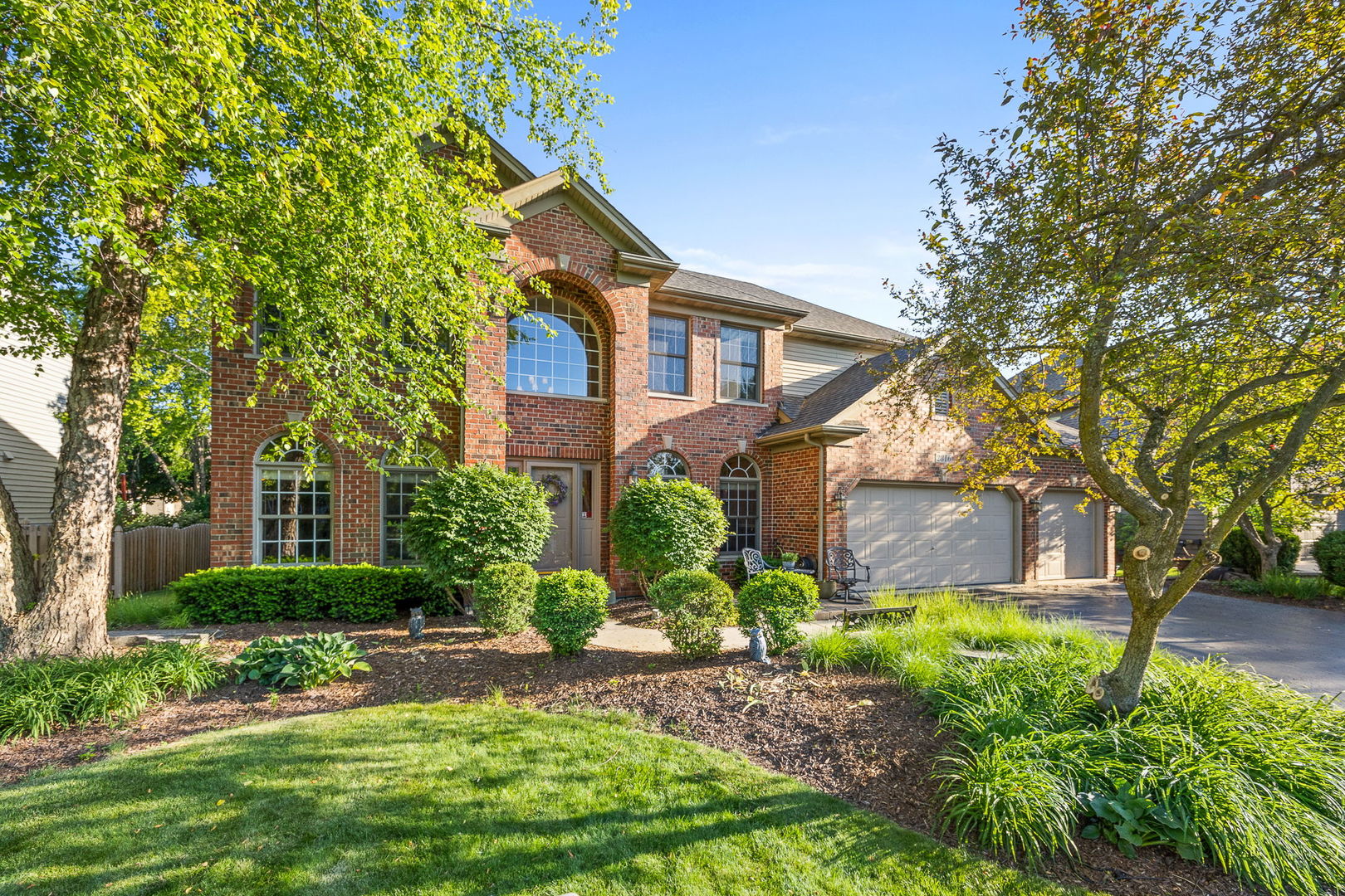 2816 Cordgrass Road Naperville, IL 60564 - Photo 48 of 49 a front view of a house with garden