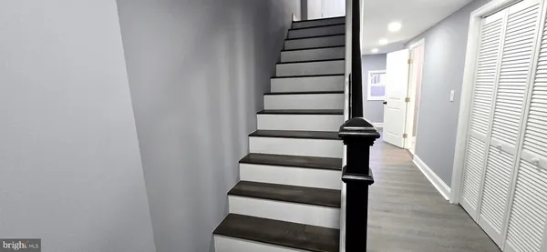 a view of entryway with wooden floor