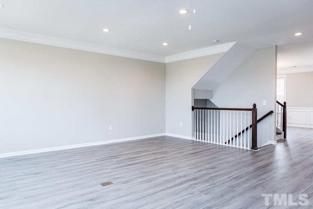 3247 Lynn Road, Unit 19 Raleigh, NC 27613 - Photo 11 of 20 a view of entryway with wooden floor