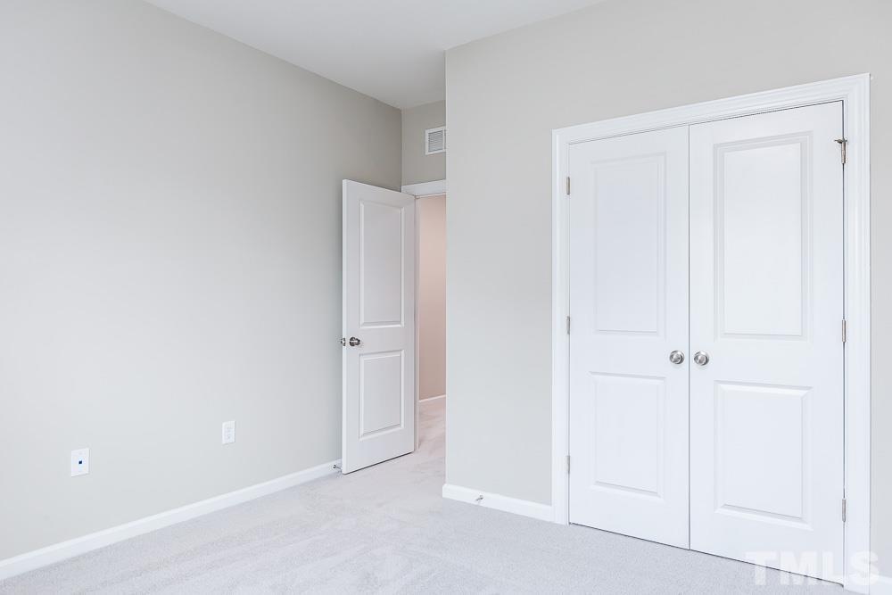 3247 Lynn Road, Unit 19 Raleigh, NC 27613 - Photo 16 of 20 a view of an empty room