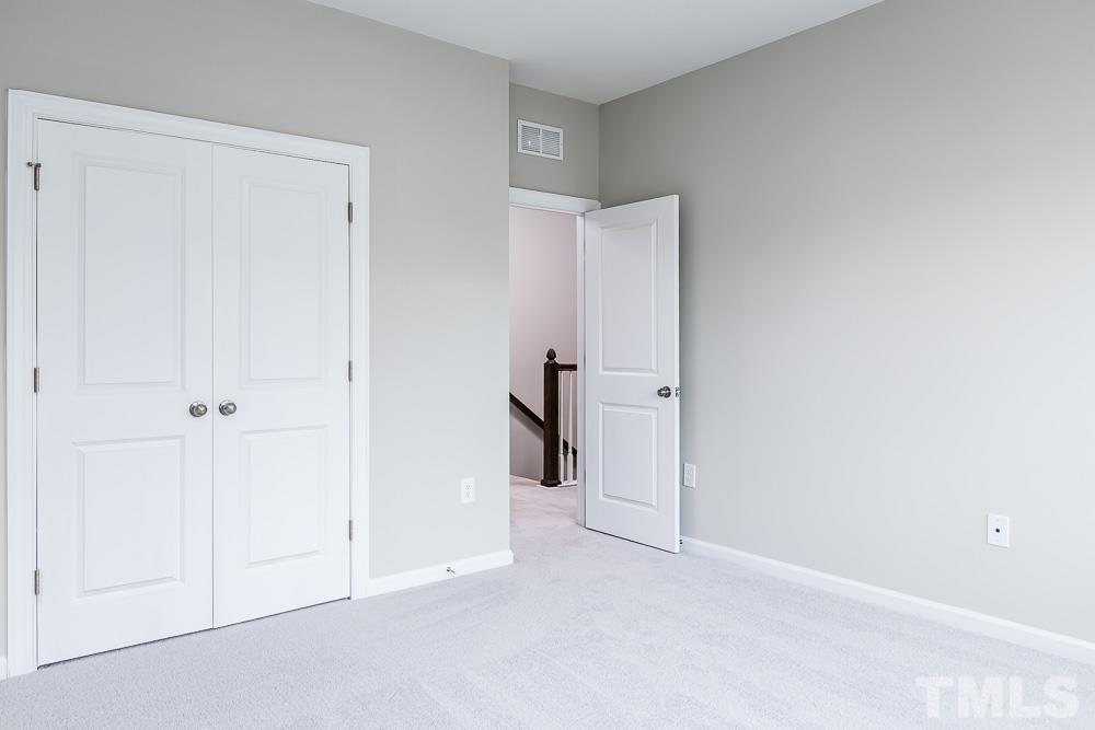 3247 Lynn Road, Unit 19 Raleigh, NC 27613 - Photo 18 of 20 a view of an empty room