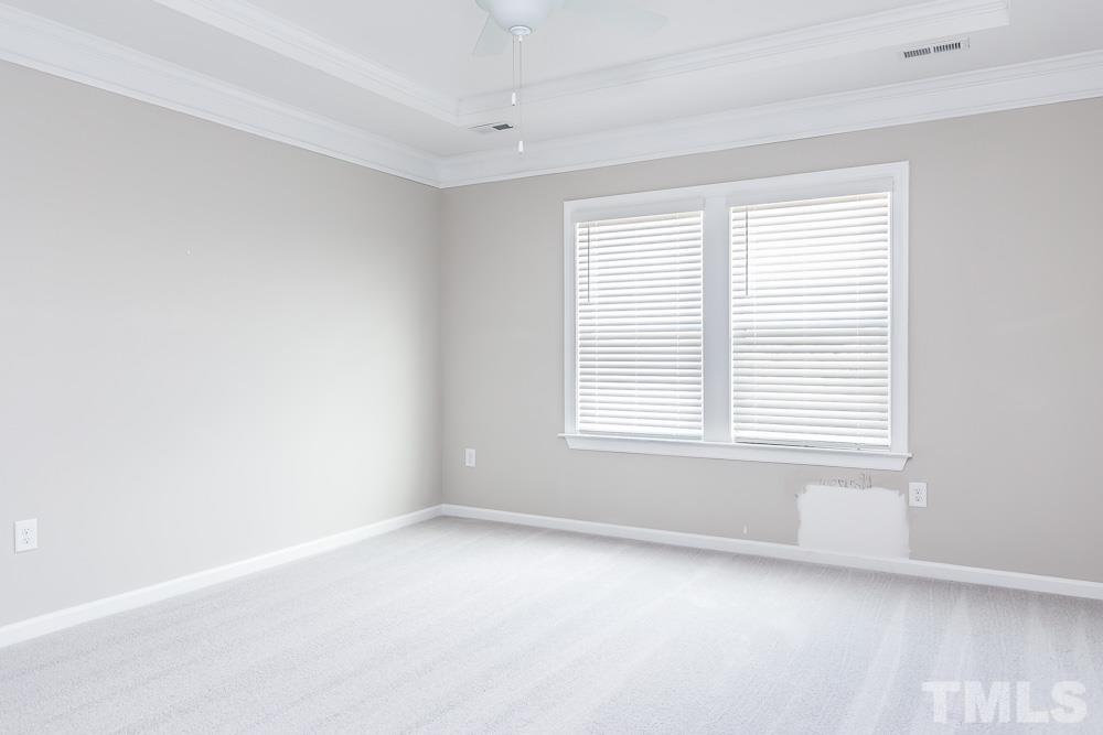 3247 Lynn Road, Unit 19 Raleigh, NC 27613 - Photo 20 of 20 a view of an empty room with a window