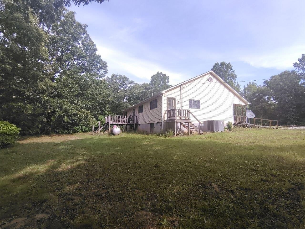 1475 Authur Byrd Road Pocahontas, TN 38061 - Photo 29 of 37 Single-story residence featuring light-colored siding and a gabled roofline