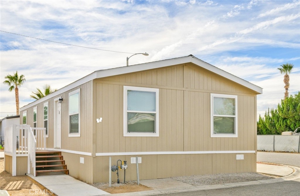 a view of a house with many windows