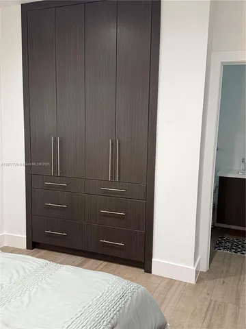 a bathroom with a sink a toilet and bathtub