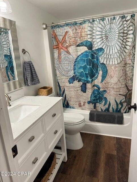 23223 Front Beach Road, Unit 703 Panama City Beach, FL 32413 - Photo 20 of 34 a bathroom with a toilet sink and mirror