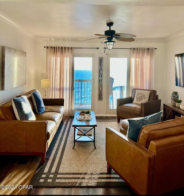 23223 Front Beach Road, Unit 703 Panama City Beach, FL 32413 - Photo 2 of 34 a living room with furniture and a large window