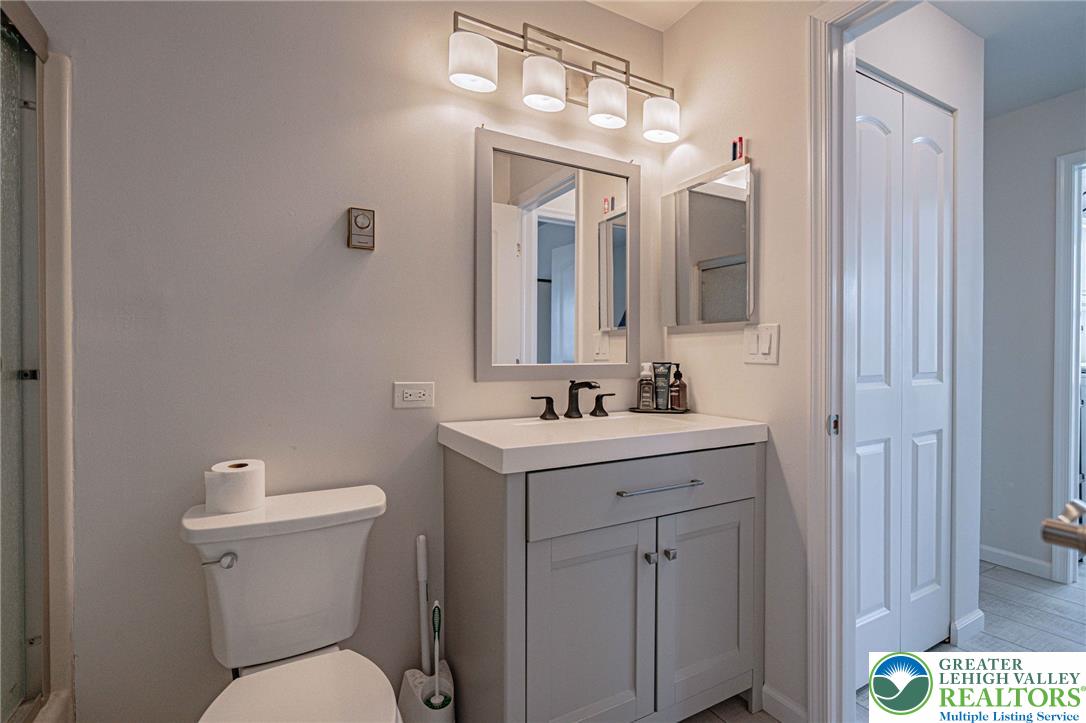 25 North 8th Street Emmaus, PA 18049 - Photo 18 of 51 A well-appointed bathroom with contemporary vanity and essential amenities for daily routines.