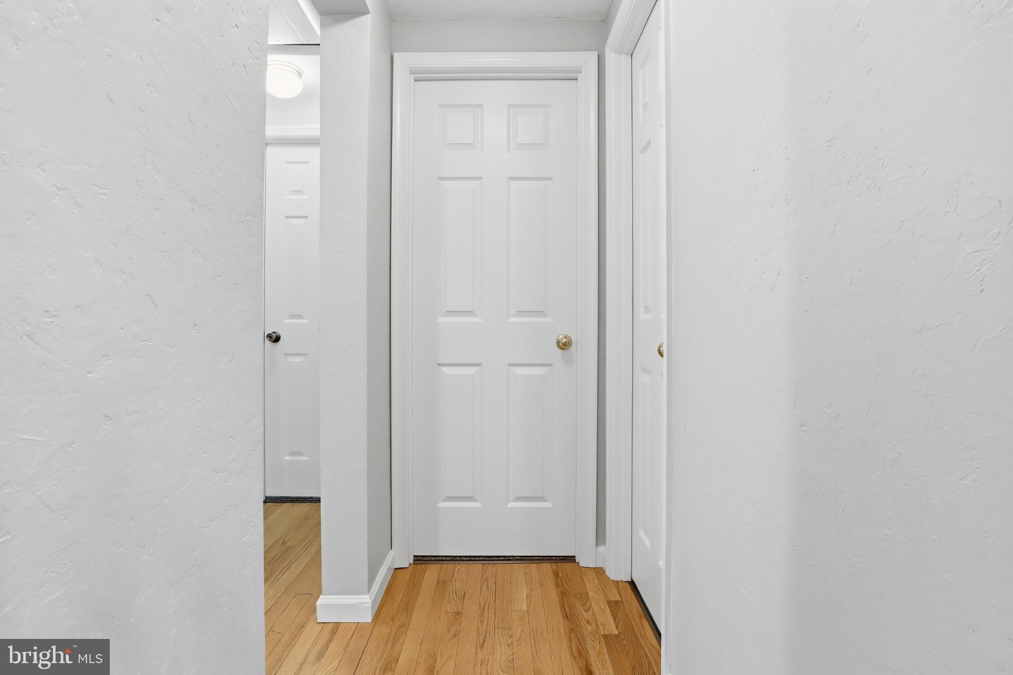 2530 Mill Creek Road Dover, PA 17315 - Photo 23 of 69 Bright and inviting hallway with wooden floors.