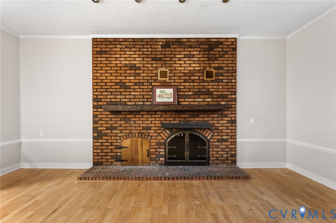 3151 Mountclair Road Chester, VA 23831 - Photo 34 of 36 Brick fireplace featuring an arched firebox with i