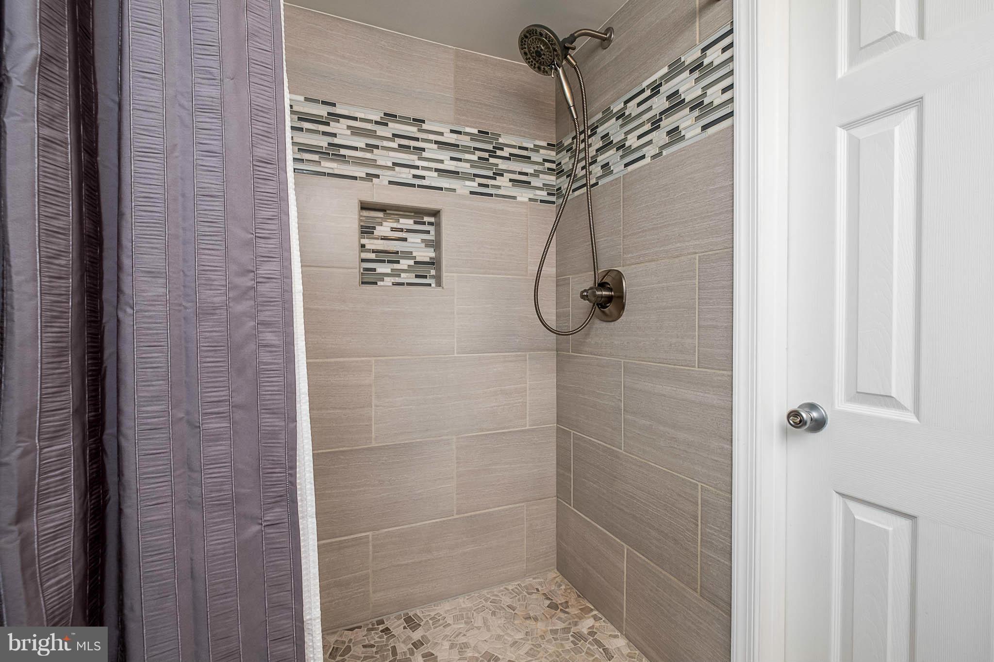 2837 Southview Road Ellicott City, MD 21042 - Photo 23 of 30 Newly renovated walk-in shower with custom tile
