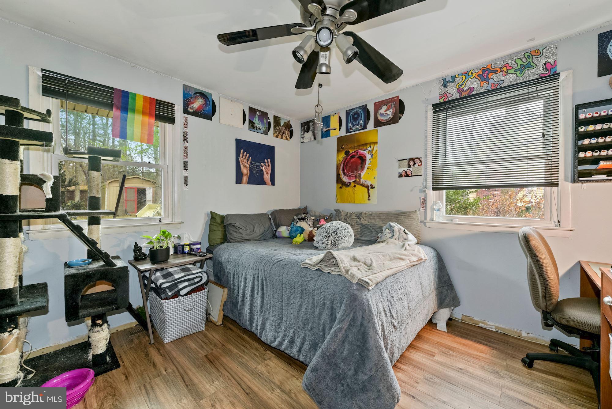 374 Holly Road Marlton, NJ 08053 - Photo 17 of 28 a bedroom with a bed and wooden floor
