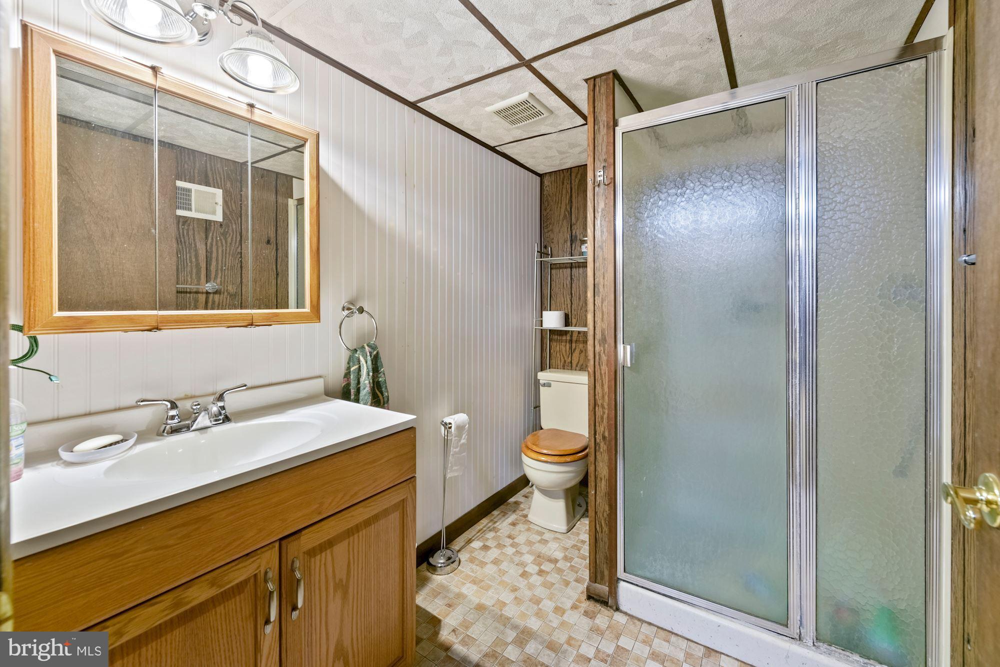374 Holly Road Marlton, NJ 08053 - Photo 18 of 28 a bathroom with a sink a toilet and shower