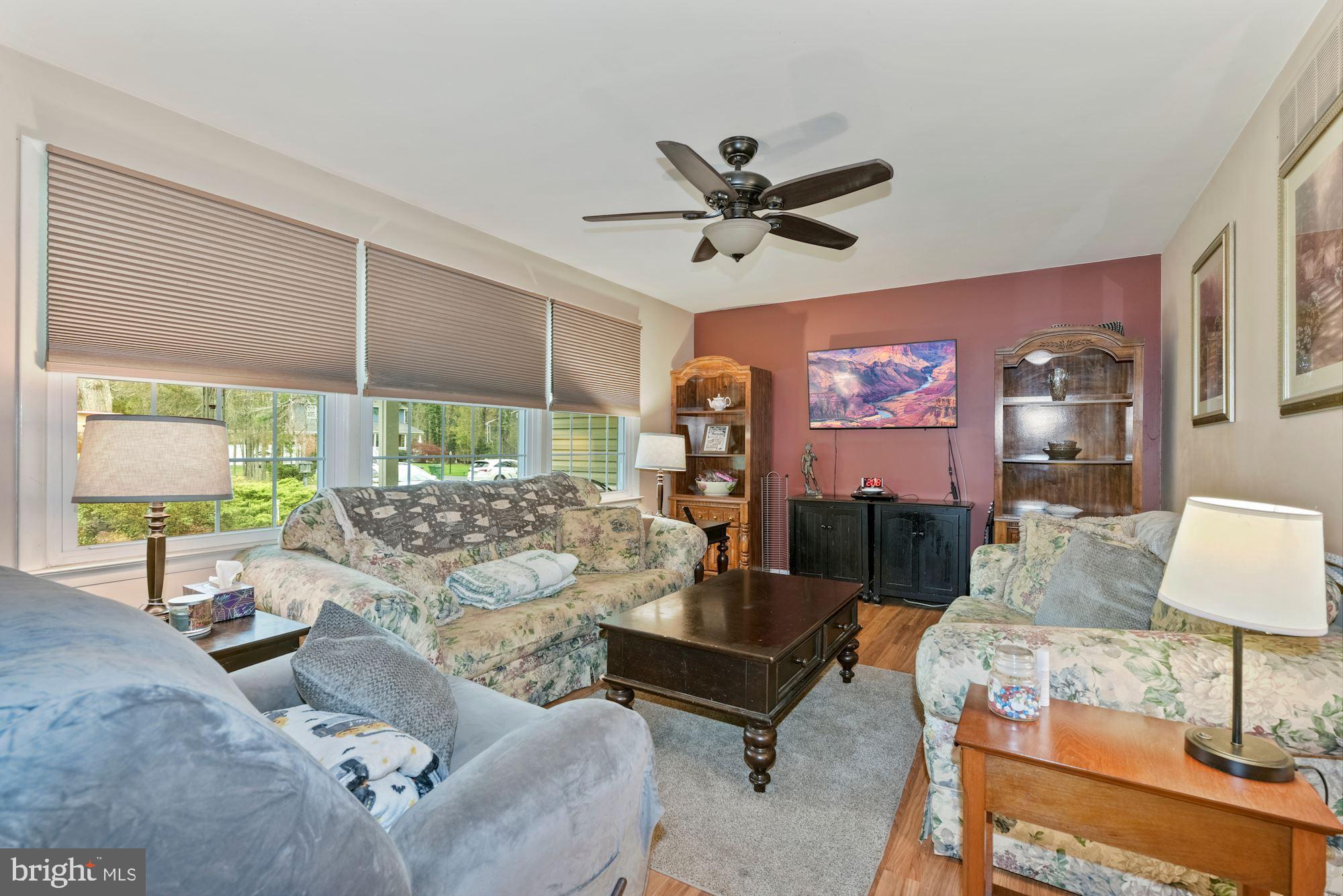 374 Holly Road Marlton, NJ 08053 - Photo 3 of 28 a living room with furniture and a large window