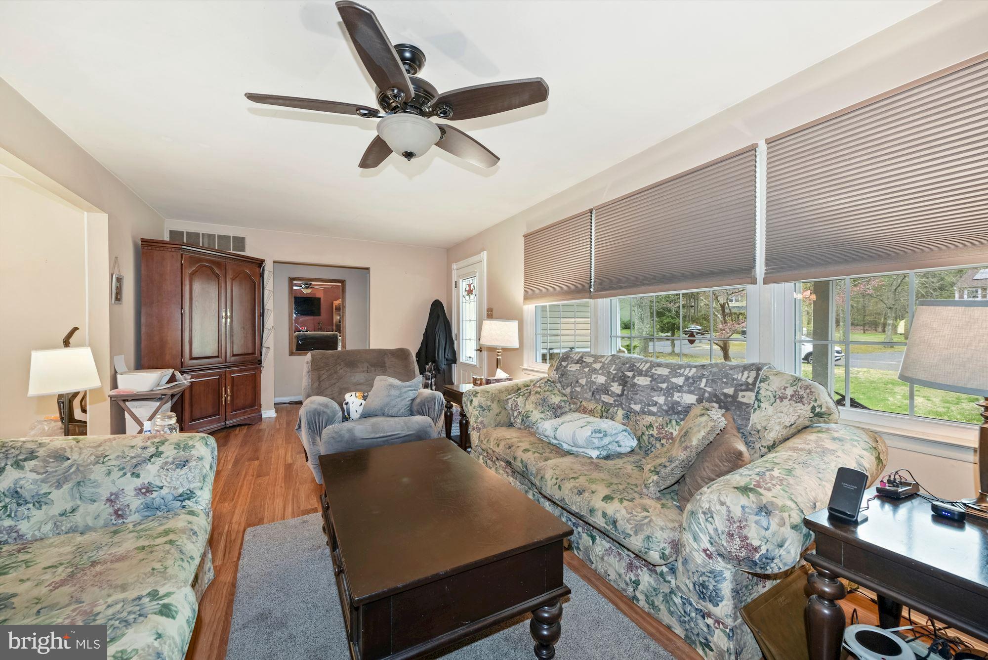 374 Holly Road Marlton, NJ 08053 - Photo 4 of 28 a living room with furniture and a large window