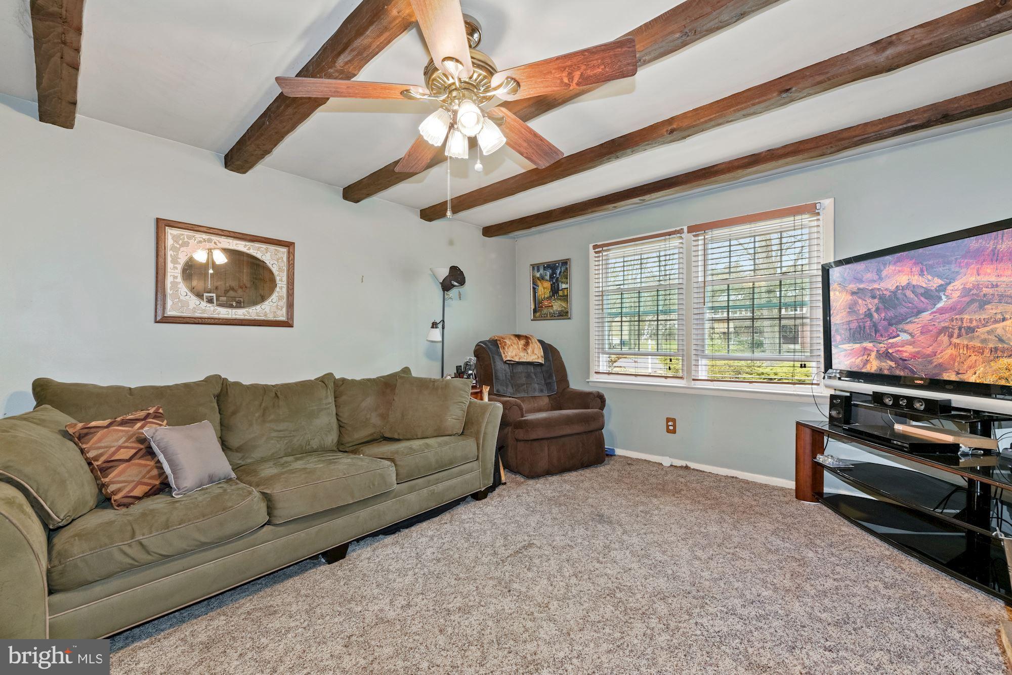 374 Holly Road Marlton, NJ 08053 - Photo 10 of 28 a living room with furniture and a flat screen tv