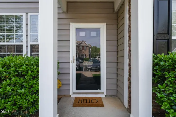 a view of a entryway door front of a house