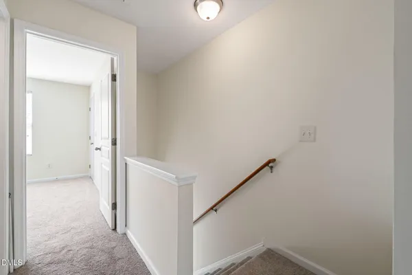 a view of a hallway with entryway