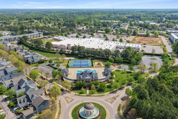 an aerial view of a house with a lake view