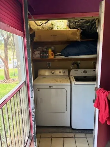 a utility room with dryer and washer