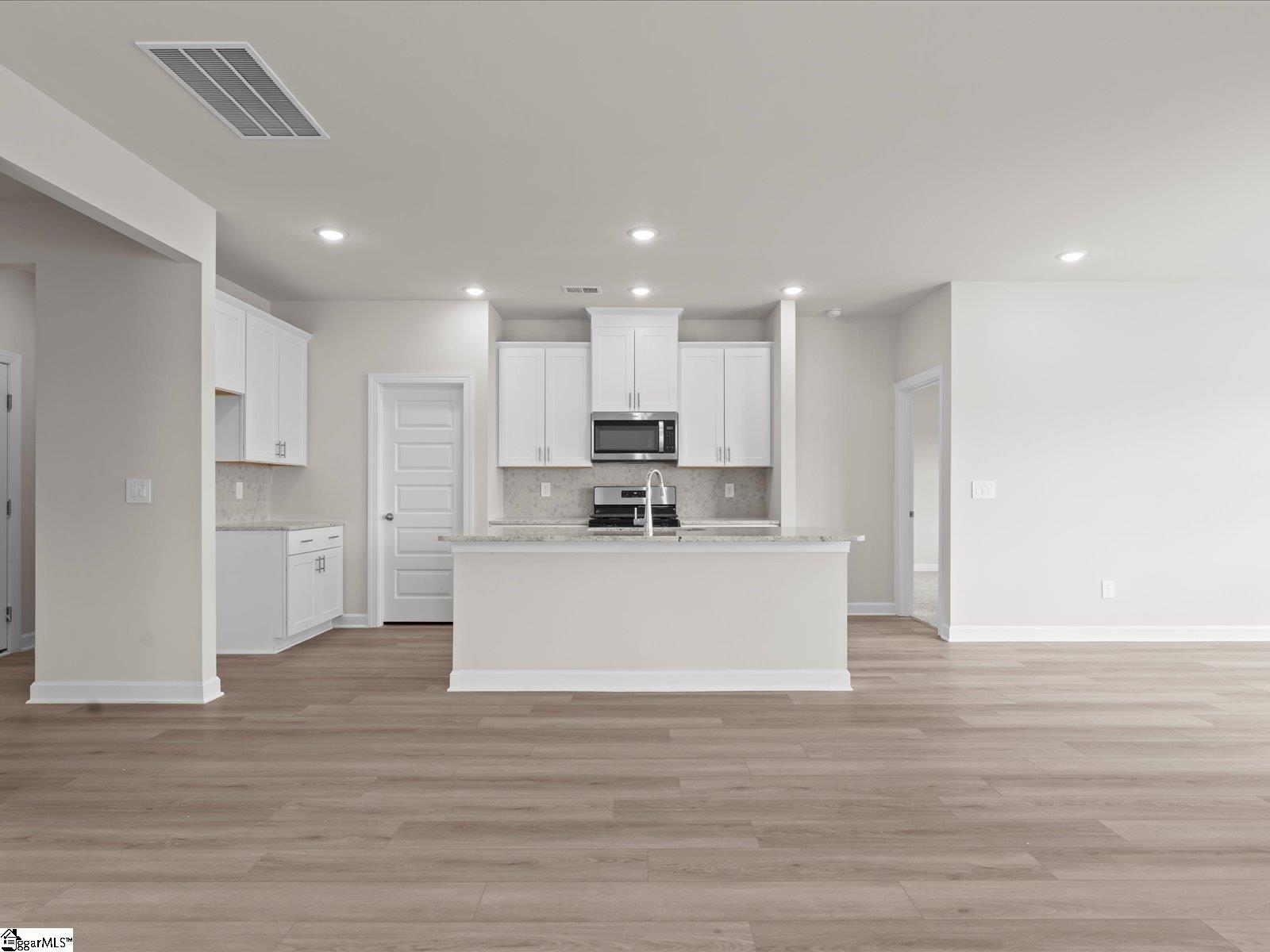 103 Blooming Meadow Road Piedmont, SC 29673 - Photo 5 of 10 Photo is not of the actual home, but is an inspirational photo of builder’s model home and may depict options, furnishings, and/or decorator features that are not included