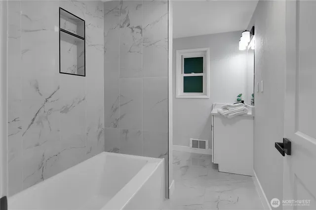 a bathroom with a bathtub