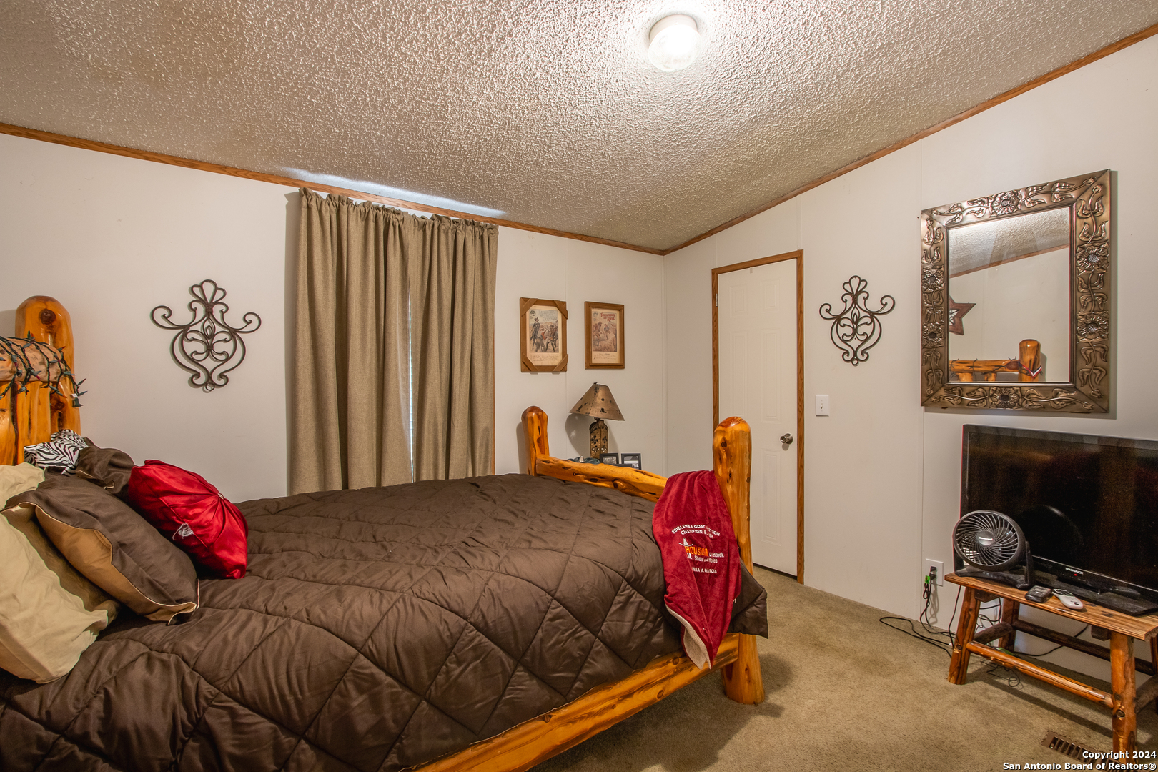 Tbd Ward Ranch Road Comstock, TX 78837 - Photo 3 of 20 a bedroom with a bed and dresser