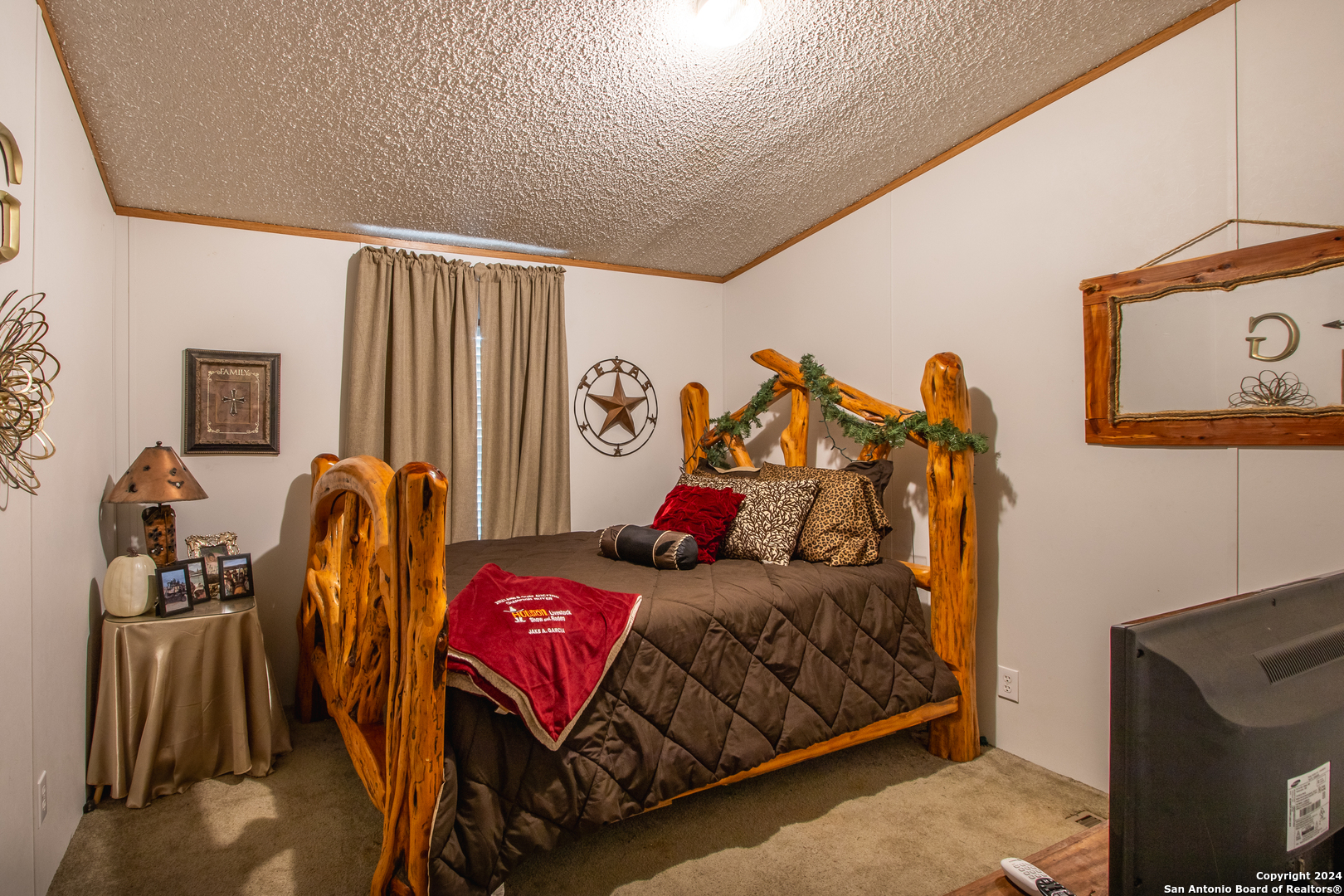 Tbd Ward Ranch Road Comstock, TX 78837 - Photo 4 of 20 a bedroom with two beds and a window