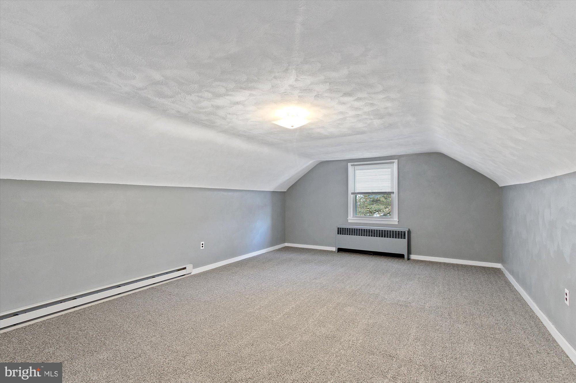 222 Dew Drop Road York, PA 17402 - Photo 18 of 31 an empty room with windows